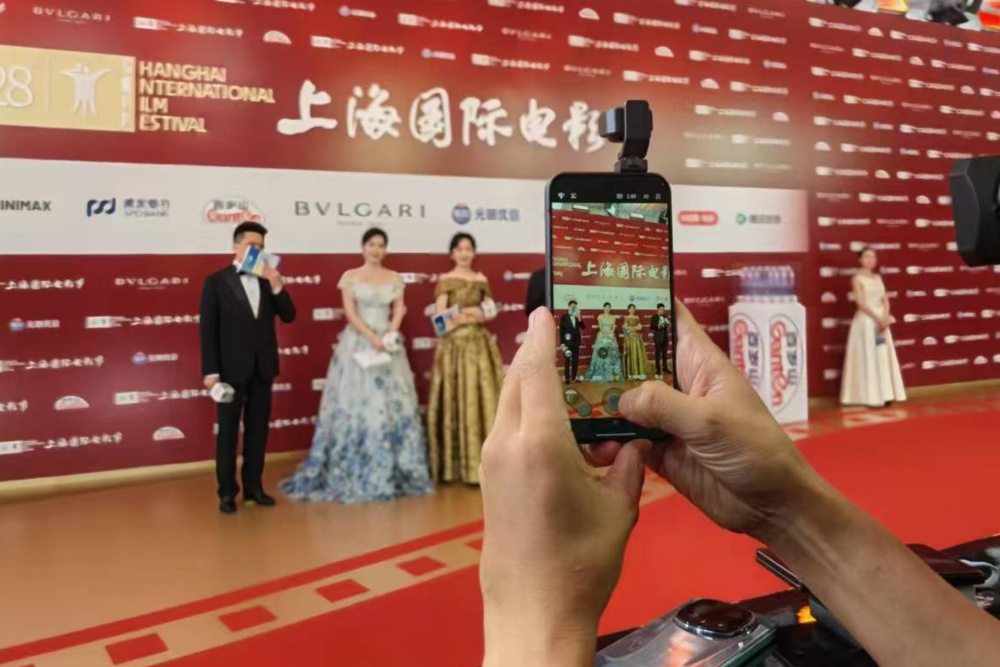 Source-feed image associated with Honor and Arri’s Robot Phone Debuts on Shanghai Film Festival Red Carpet