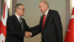 Source-feed image associated with Starmer gifted gun and ammunition by Turkish president at Nato