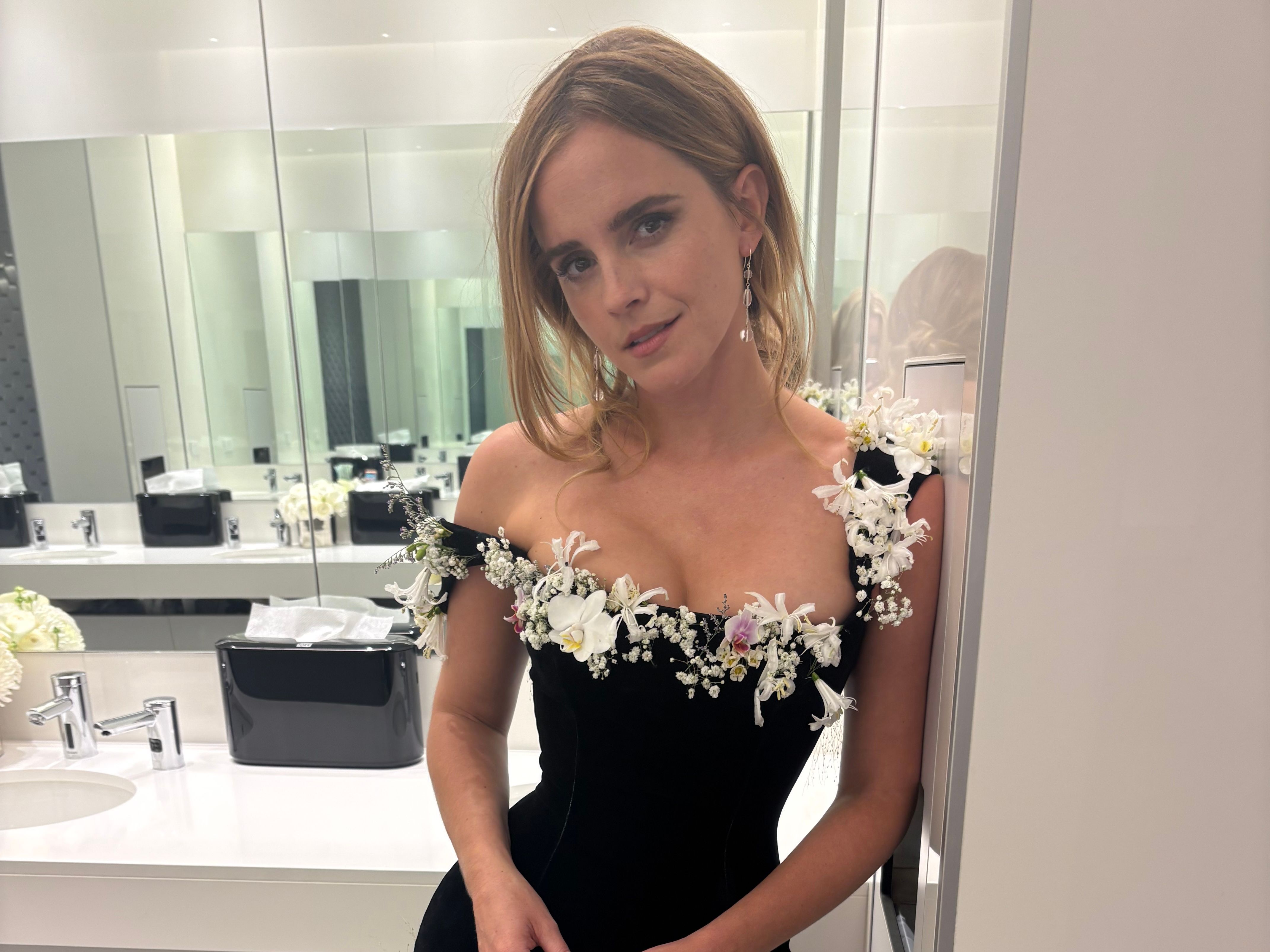 Image from linked report: Emma Watson Wore a Dress Made With Real Flowers to the Lucas Museum Opening