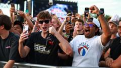 Source-feed image associated with Trump and thousands of others watch UFC fight on White House lawn