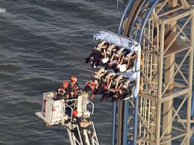 Source-feed image associated with WATCH: Texas roller coaster riders rescued after getting stuck for hours 100 feet in air