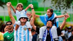 Source-feed image associated with In pictures: Joyous fans gather across the US and Canada to watch World Cup final