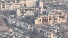 Image from linked report: Residents eating garden weeds in Russian-occupied city cut off from food and water