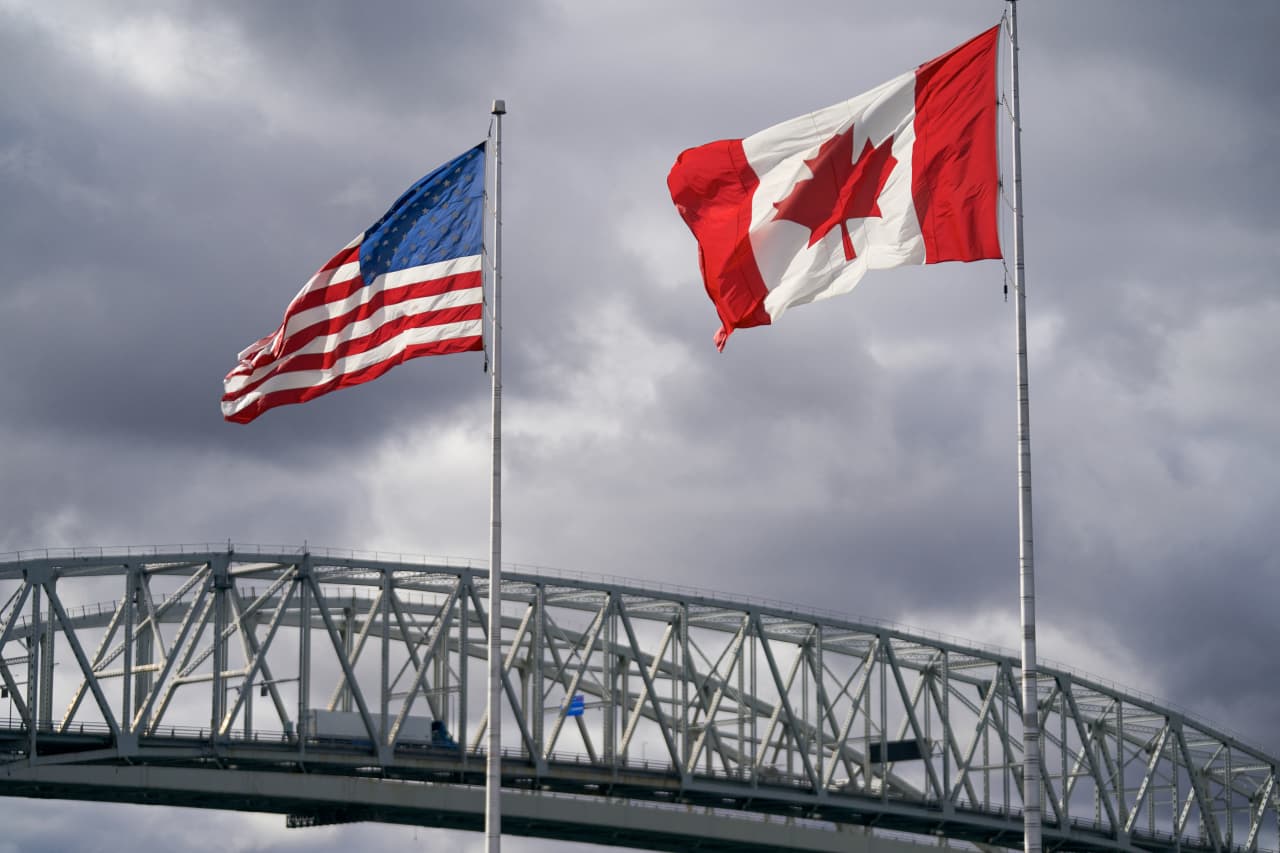 Source-feed image associated with Stock futures flat as U.S. and Canada appear headed for trade war