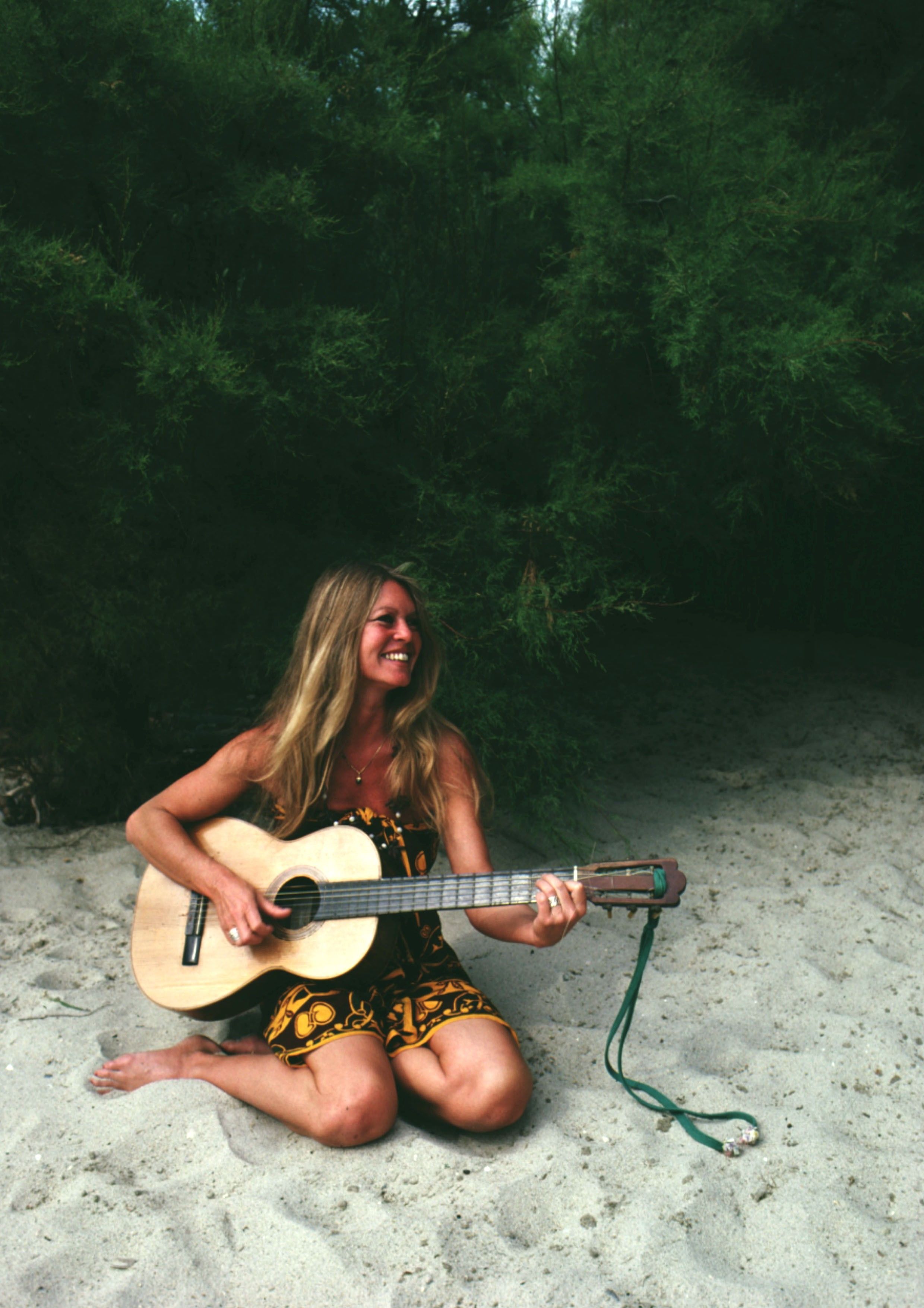 Source-feed image associated with 18 Iconic Photographs of Brigitte Bardot at the Beach