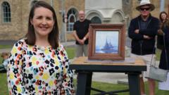 Source-feed image associated with Antiques Roadshow expert Theo Burrell dies aged 39
