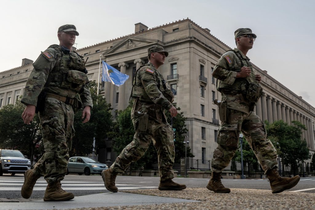 Source-feed image associated with Trump threatens lawsuit against nonprofit that questioned whether National Guard plan lessened crime