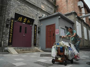 Source-feed image associated with Chinese theater, promoter fined for altered patriotic song in a comedy show