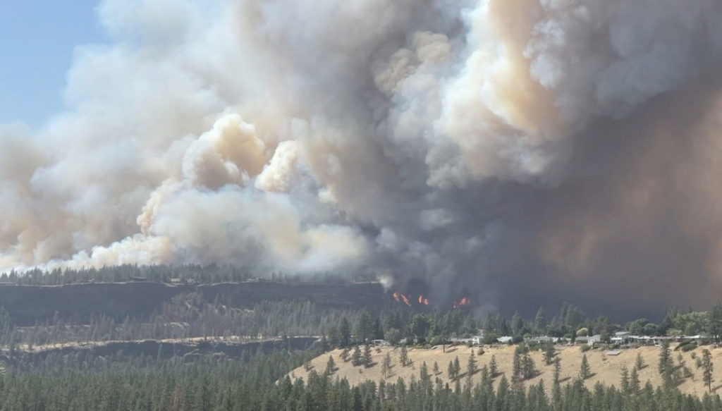 Source-feed image associated with Man charged with arson as Washington wildfires devastate Spokane area