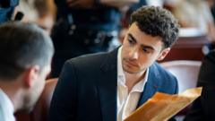 Source-feed image associated with Mangione's lawyers plan psychiatric defence in state murder trial