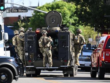 Source-feed image associated with Police locked in negotiations with man in Bakersfield holding hostages