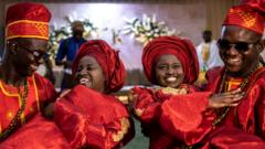 Source-feed image associated with Twins marry twins in joyous Nigerian joint wedding