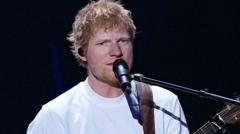 Source-feed image associated with Robert Kraft says Ed Sheeran asked him to donate $2m in aid after Macklemore backlash