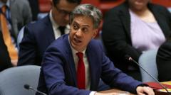 Image from linked report: Miliband tells Iran minister UK will not tolerate 'hostile activity' on British soil