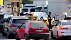 Source-feed image associated with Rosenberg: Shortage of petrol but not patriotism as Russians feel growing impact of war