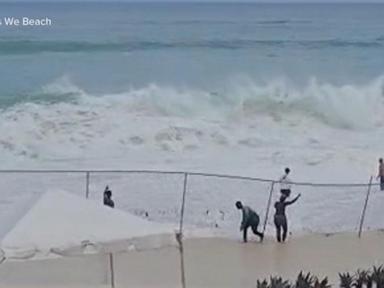 Image from linked report: WATCH: Video shows woman's terrifying rescue from rough surf in the Bahamas
