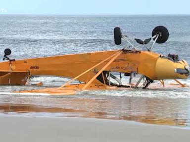 Source-feed image associated with WATCH: Pilot rescued after banner plane crashes into Florida surf