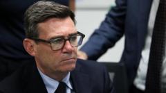 Source-feed image associated with Justice secretary apologises to families affected by early release scheme
