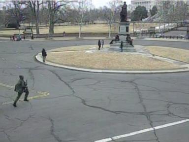 Source-feed image associated with Georgia teen pleads guilty to gun charge for running onto Capitol grounds with loaded shotgun