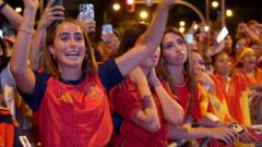 Source-feed image associated with Moment fans in Madrid celebrate World Cup win