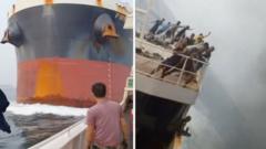 Image from linked report: Watch: Dramatic moment a cargo ship crashes into another vessel