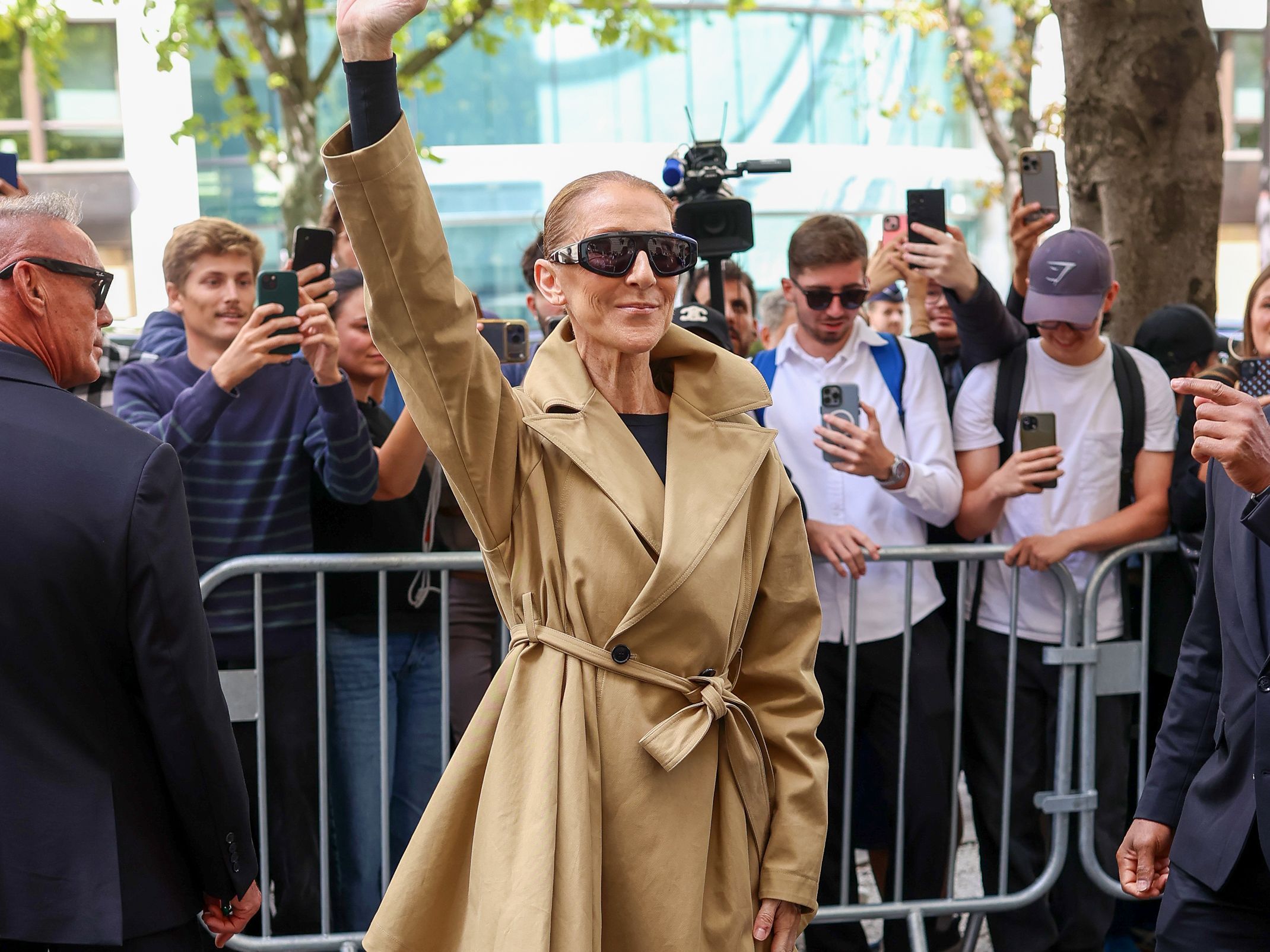 Source-feed image associated with Celine Dion Is Turning the Streets of Paris Into Her Runway