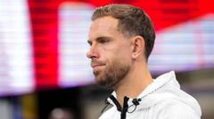 Source-feed image associated with England's Henderson injures wrist during match celebration