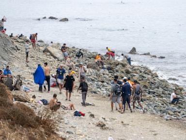 Source-feed image associated with 60,000 migrants crossed into Spanish territory of Ceuta, but most left voluntarily
