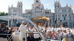 Source-feed image associated with Huge crowds throng Madrid streets for Pope's open-air mass