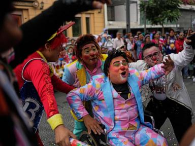 Source-feed image associated with Clown Day in Peru, violence in Colombia and other top photos from Latin America and the Caribbean