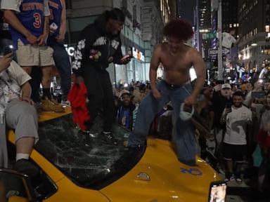 Source-feed image associated with WATCH: Rowdy fans pour into streets after NBA Finals game in NYC
