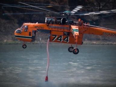 Source-feed image associated with WATCH: Helicopter involved in fighting wildfires crashes, Utah authorities say