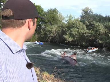Source-feed image associated with WATCH: Boat rescue plays out as reporter records story