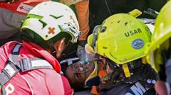 Source-feed image associated with Venezuela quake survivor pulled out alive after eight days