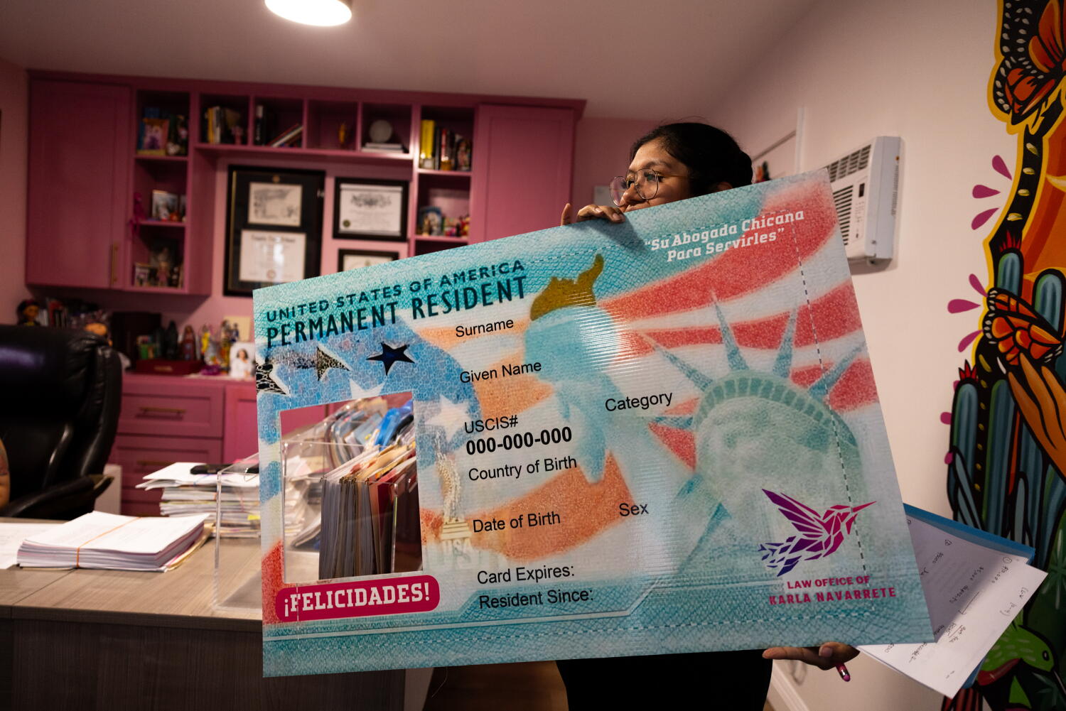 Source-feed image associated with California, others challenge Trump effort to deny green cards over past use of public aid