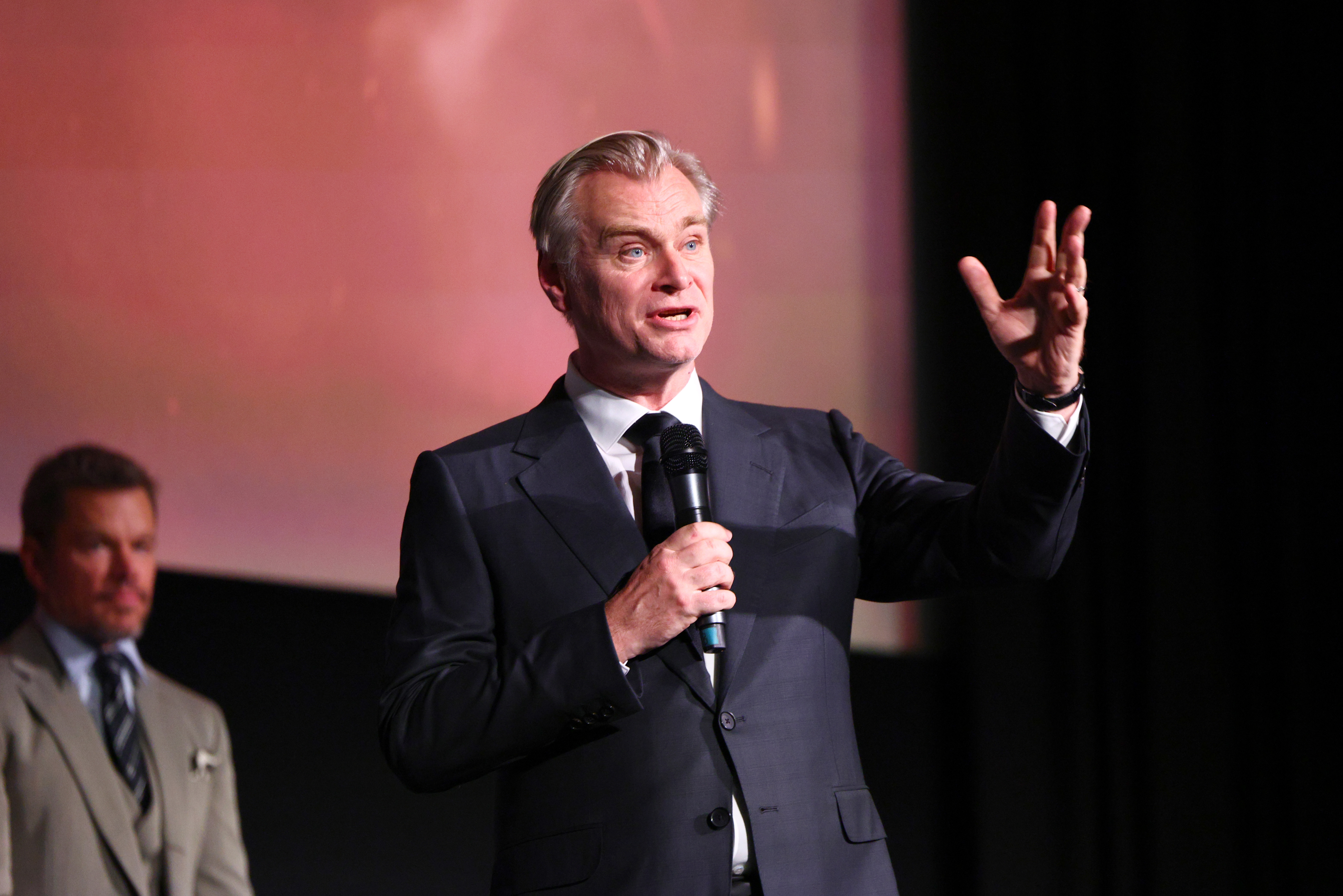 Source-feed image associated with Christopher Nolan Dedicates ‘The Odyssey’ to Late Imax Pioneer David Keighley