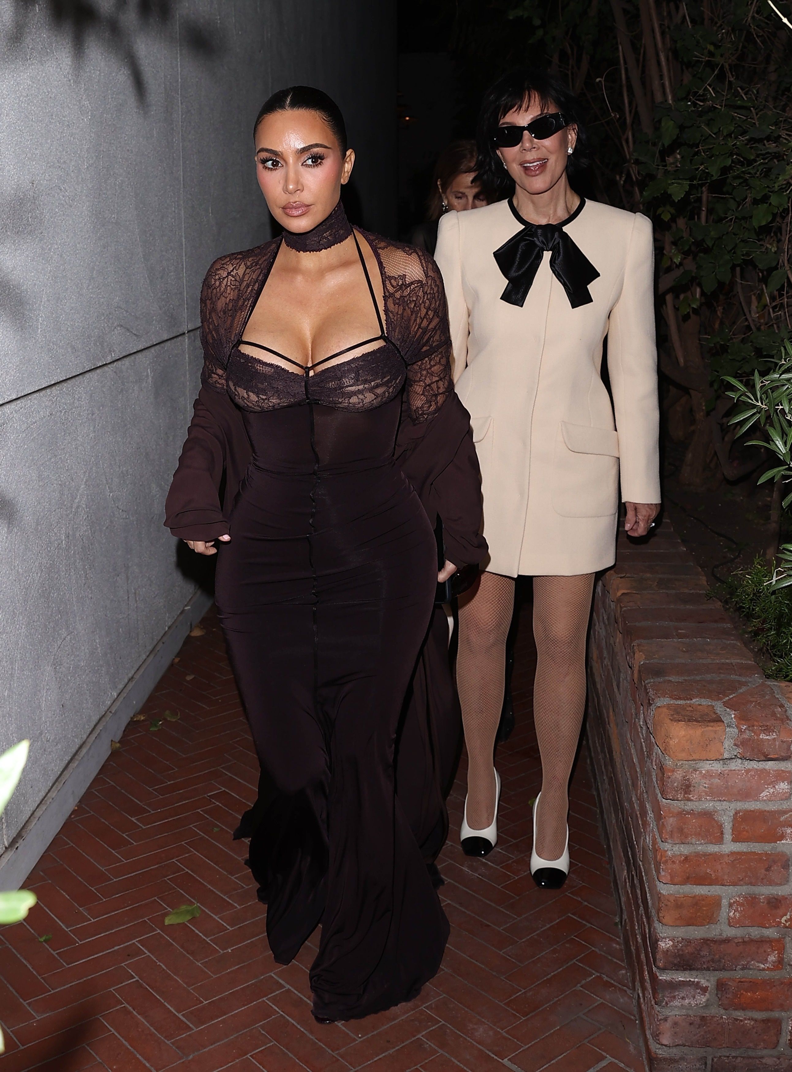 Source-feed image associated with Kim Kardashian and Kris Jenner Make Family Dinner a Fashion Affair