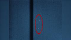 Source-feed image associated with Watch: Sixth batch of UFO files includes orbs from 1952