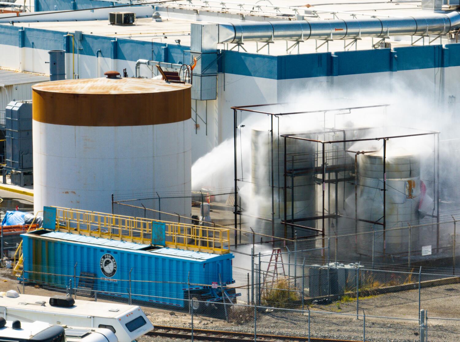 Source-feed image associated with The FBI serves a search warrant at the Garden Grove chemical plant