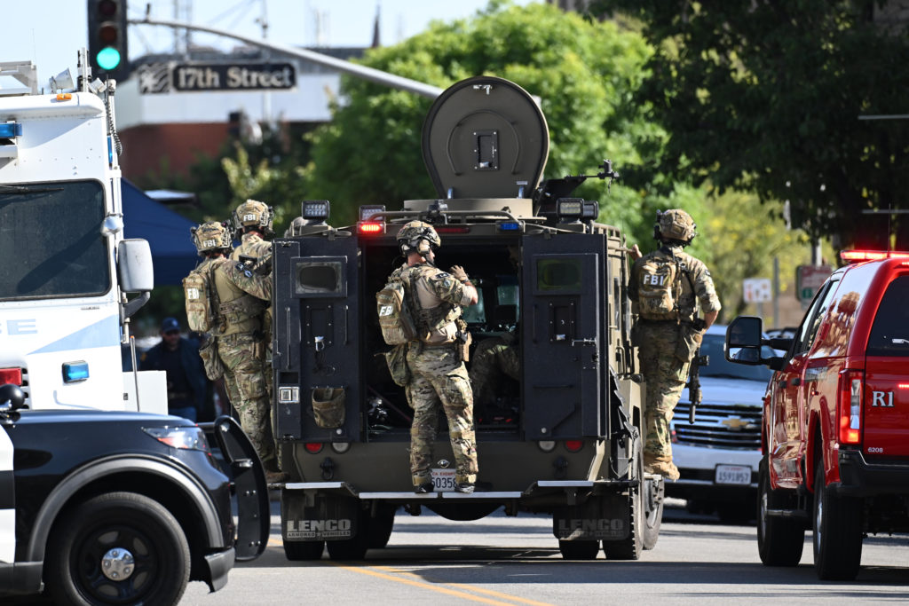 Source-feed image associated with FBI fatally shoots a man holding hostages in a California office building, police say