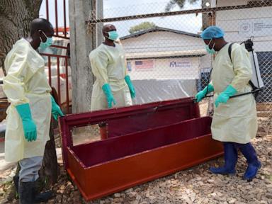 Source-feed image associated with Congo’s Ebola burial teams battle community anger, fatigue and fear of infection