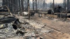 Source-feed image associated with 'The fire's right there' - Families recount fleeing Washington state wildfires