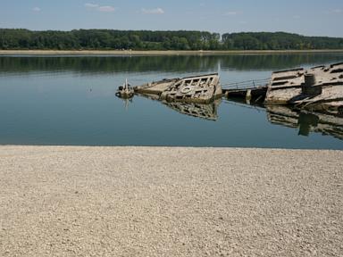 Source-feed image associated with Danube River's water is dropping so low that World War II ships are emerging
