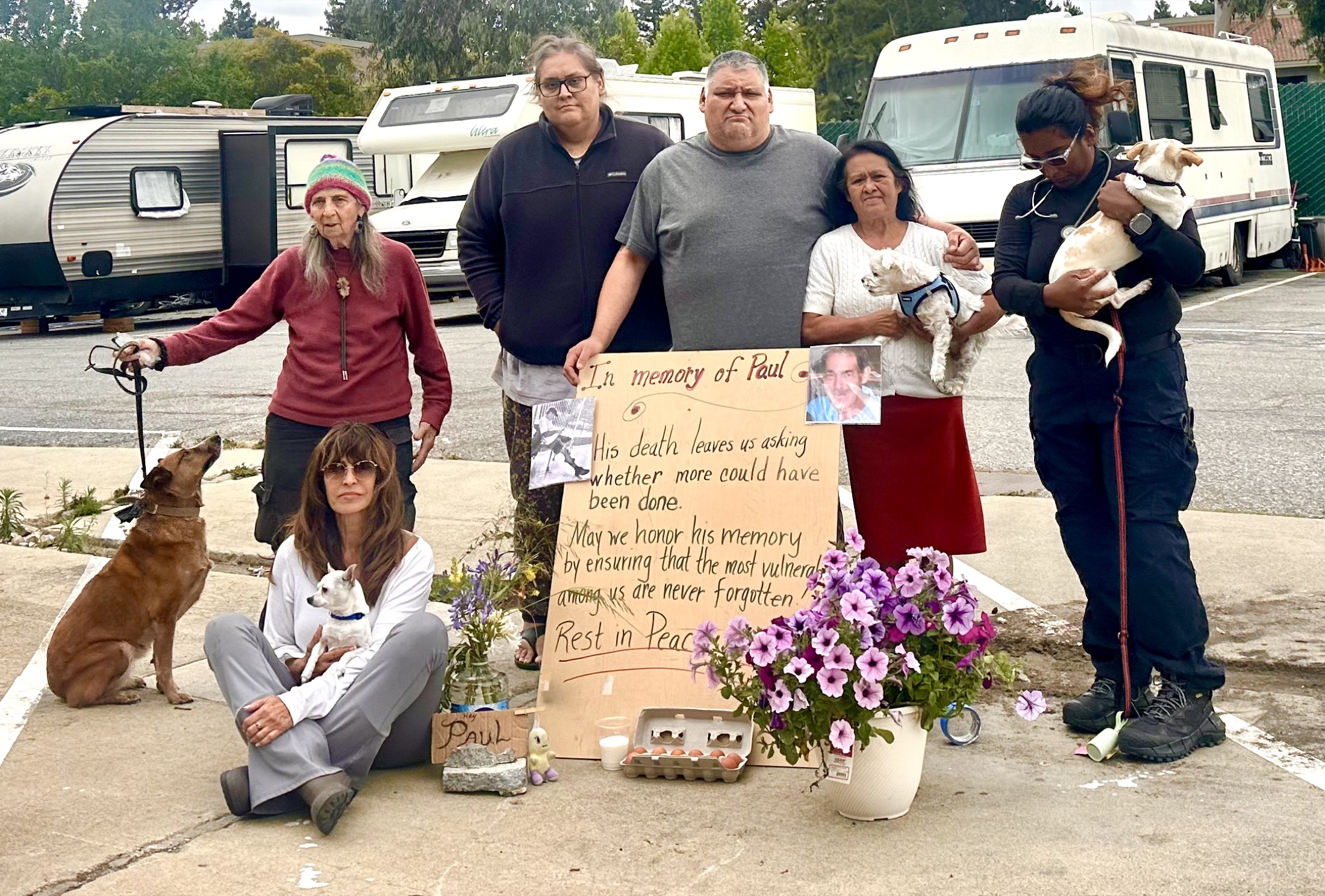 Residents gathered at a May 29, 2026 memorial for Paul A. at the Geng safe-parking site